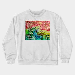 The majestic beauty of a peacock takes center stage as it sits gracefully upon a weathered metal fence Crewneck Sweatshirt